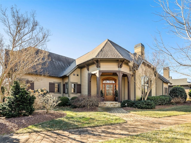 view of front of home with a front yard