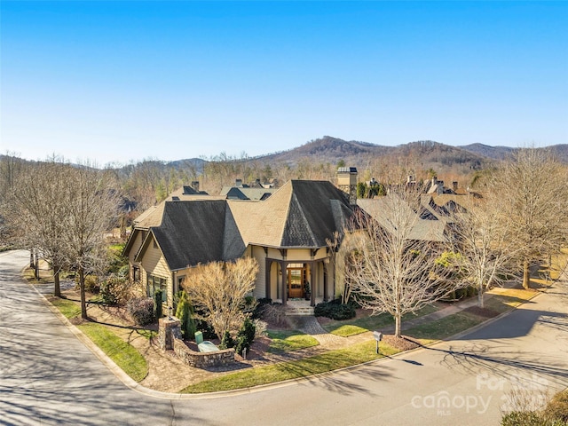 view of front of property with a mountain view