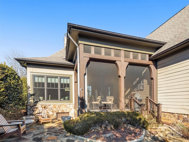 rear view of house featuring a patio