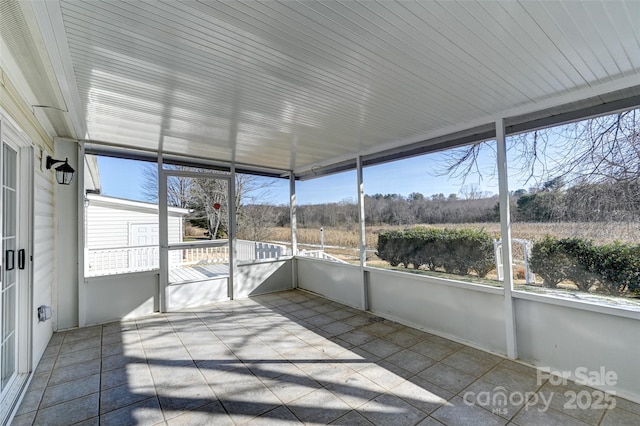 view of unfurnished sunroom