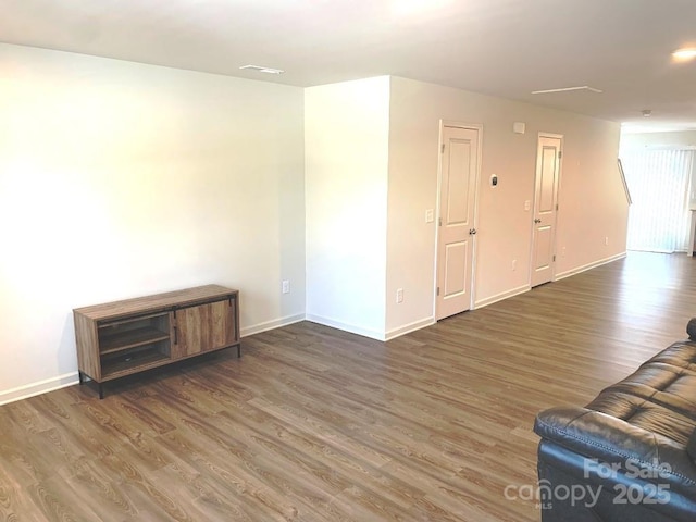 living room with dark wood-type flooring