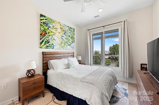 bedroom featuring ceiling fan and light wood-type flooring