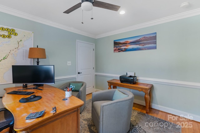 office area with ceiling fan, ornamental molding, and wood-type flooring