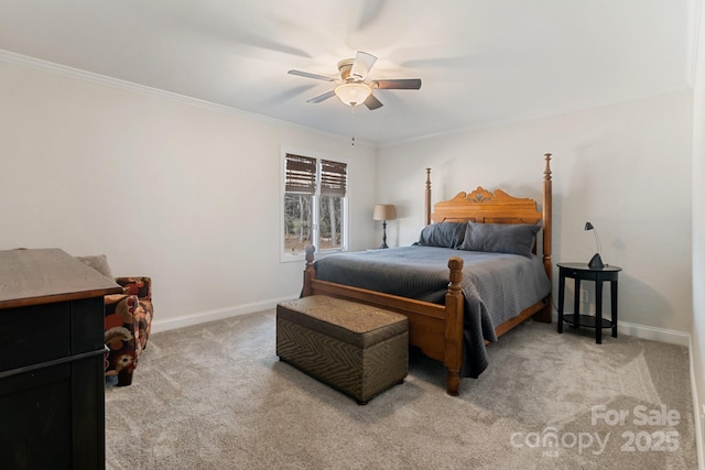 bedroom featuring crown molding, light carpet, and ceiling fan