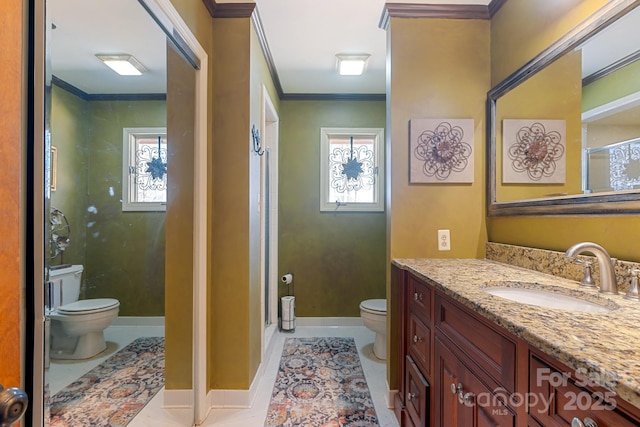 bathroom featuring crown molding, a wealth of natural light, vanity, and toilet