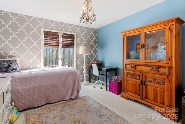 bedroom with light carpet and an inviting chandelier