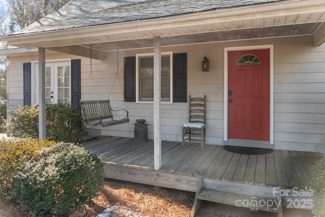 entrance to property with a porch