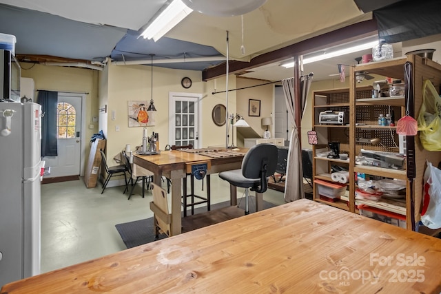 interior space featuring fridge