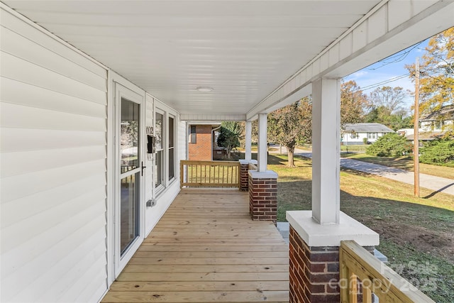 wooden deck featuring a porch