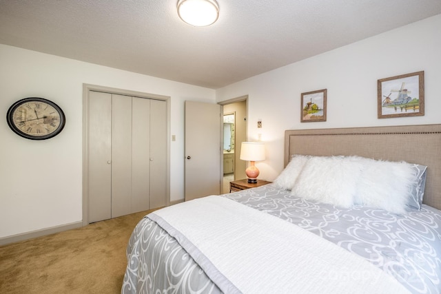 carpeted bedroom with a closet