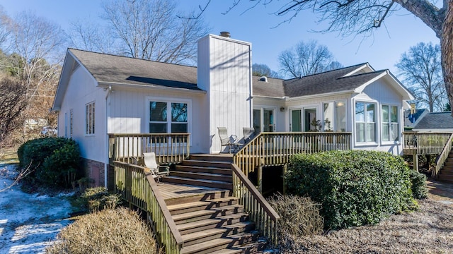 rear view of house with a deck