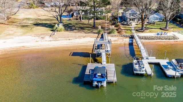 dock area with a water view