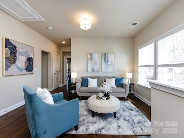 living room with dark hardwood / wood-style floors