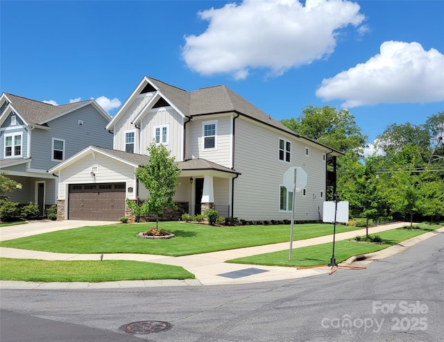 view of front facade featuring a garage and a front yard