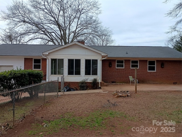 rear view of property featuring a patio