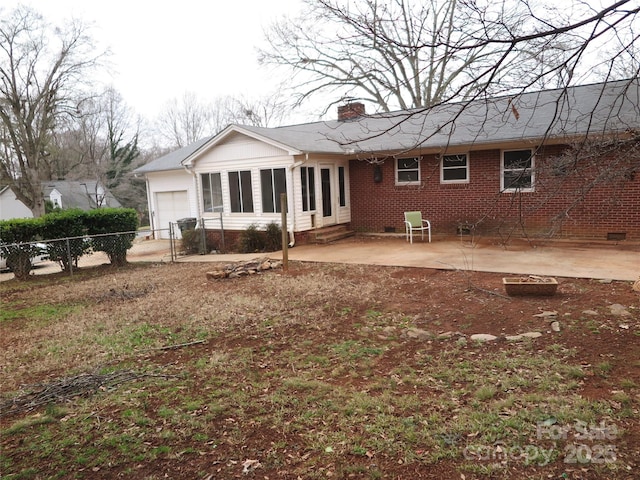 rear view of house featuring a patio area