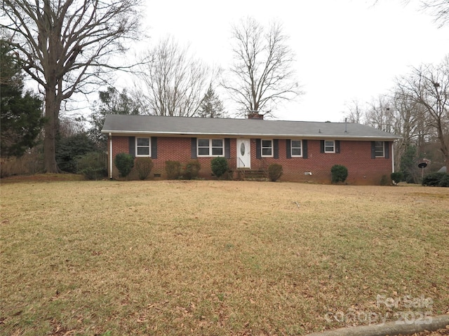 single story home featuring a front yard