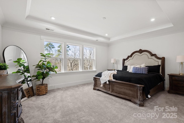 bedroom with light carpet, baseboards, visible vents, a raised ceiling, and recessed lighting