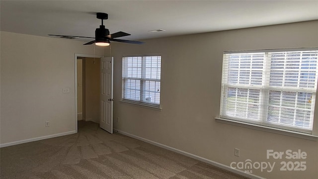 unfurnished bedroom featuring ceiling fan and carpet flooring