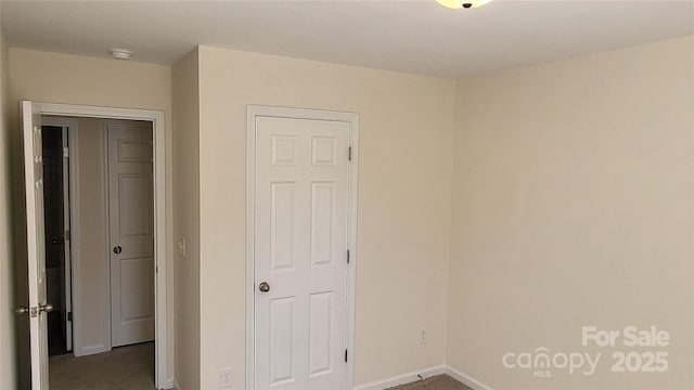 unfurnished bedroom featuring carpet floors