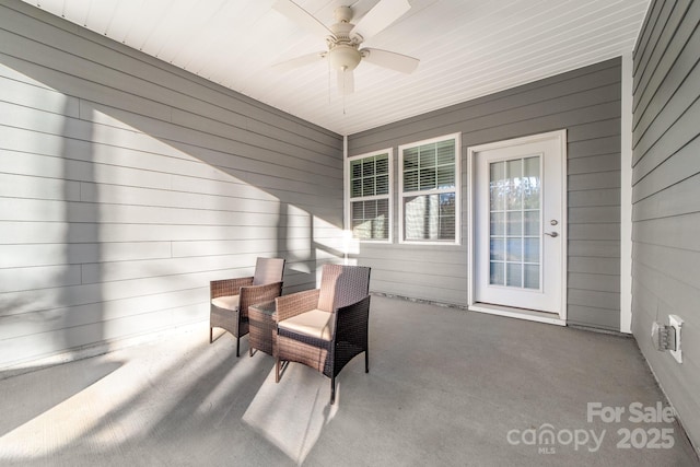 view of patio featuring ceiling fan