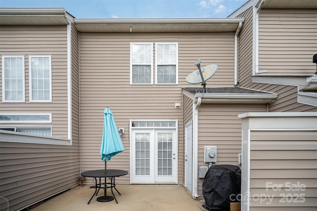 back of house with a patio area