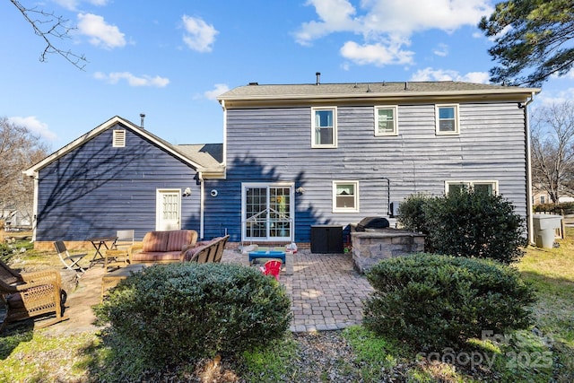 rear view of house with a patio area