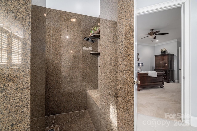 bathroom featuring ceiling fan, crown molding, and walk in shower