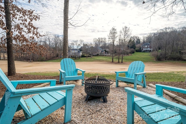 view of patio featuring an outdoor fire pit