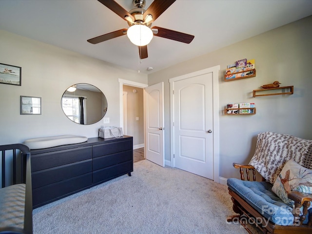 carpeted bedroom with ceiling fan