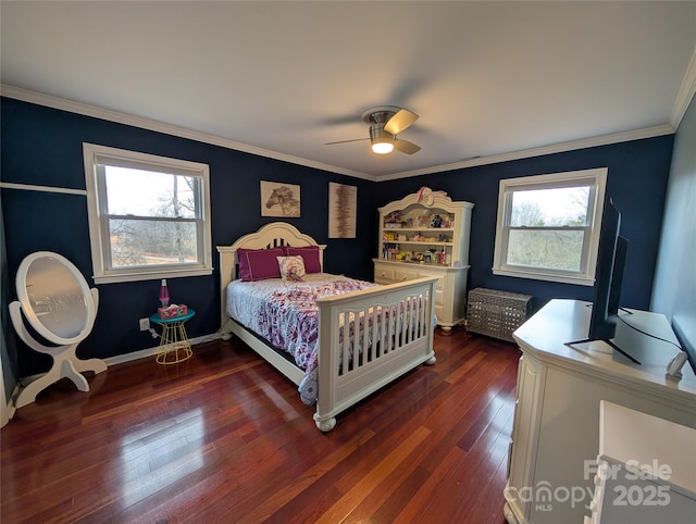 bedroom with ceiling fan, dark hardwood / wood-style floors, and crown molding