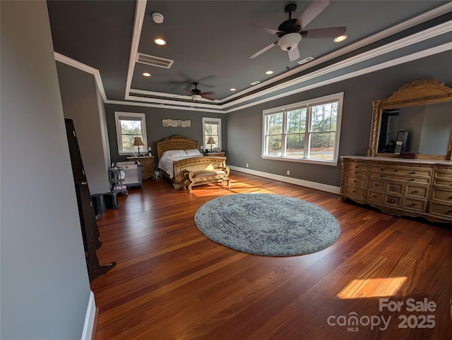 bedroom featuring ceiling fan, dark hardwood / wood-style flooring, and crown molding