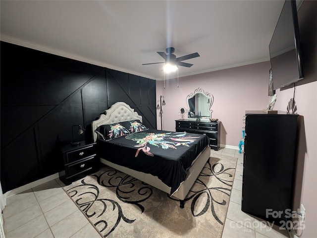 tiled bedroom with ceiling fan and crown molding