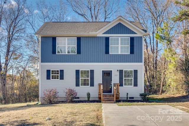 view of front of house with a front lawn