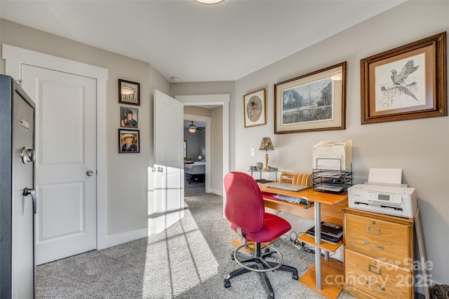 office with ceiling fan and carpet