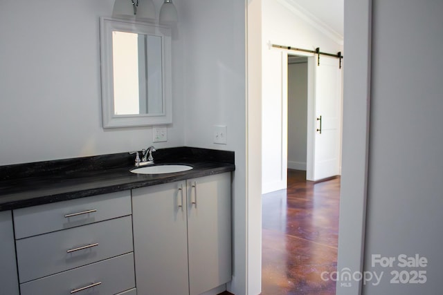 bathroom with concrete floors, vanity, and lofted ceiling