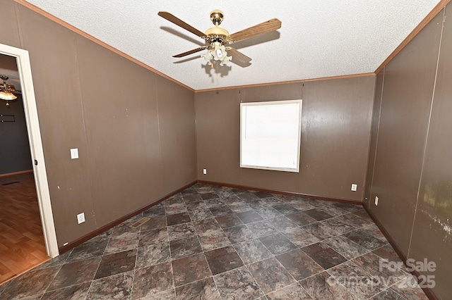 empty room with a textured ceiling, ceiling fan, and ornamental molding