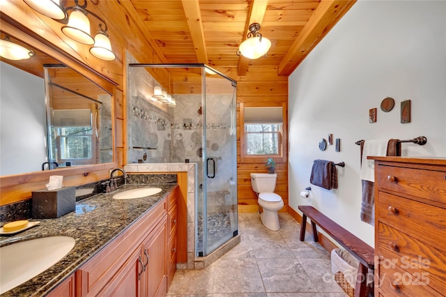 bathroom with wood ceiling, vanity, toilet, walk in shower, and beam ceiling