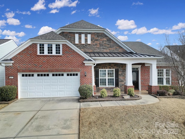 view of front of home featuring a garage