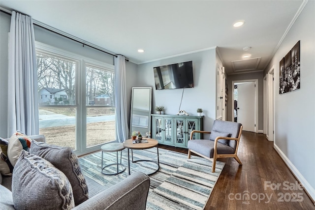 living room with ornamental molding and dark hardwood / wood-style flooring