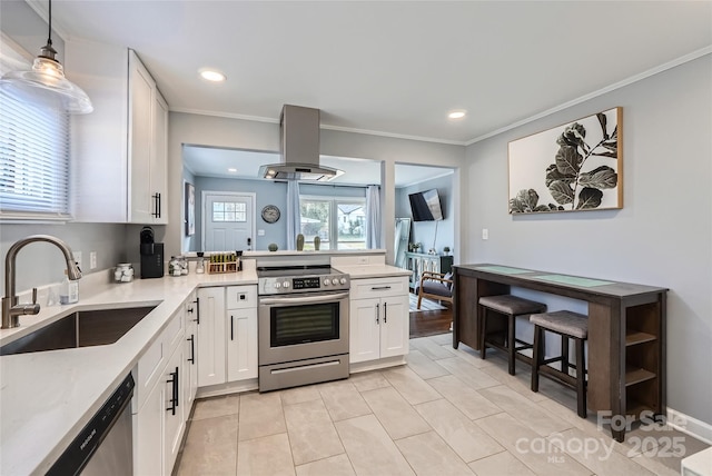 kitchen with sink, white cabinetry, stainless steel appliances, island range hood, and decorative light fixtures