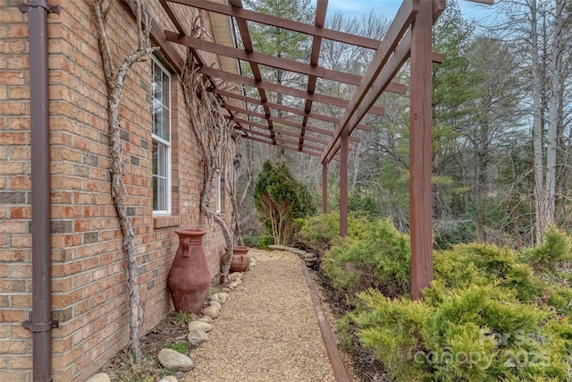 view of home's exterior featuring a pergola