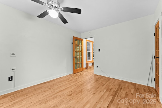 unfurnished room with ceiling fan and light hardwood / wood-style flooring