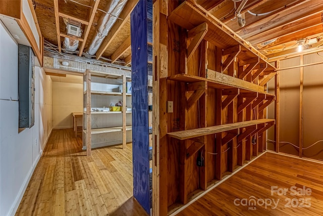 interior space with hardwood / wood-style flooring