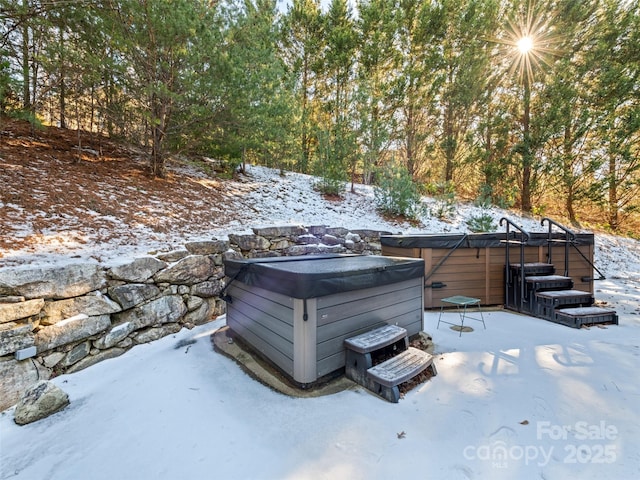 exterior space featuring a jacuzzi