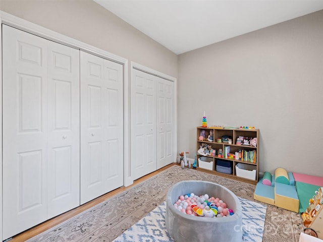 game room with hardwood / wood-style floors