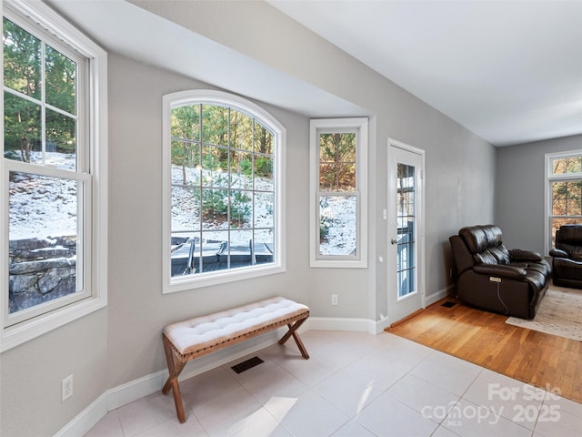 interior space with light tile patterned floors