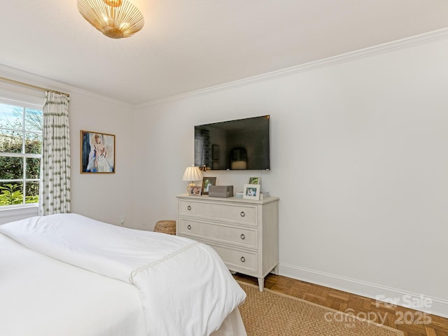 bedroom with crown molding and light parquet floors