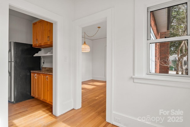 hall featuring light hardwood / wood-style flooring