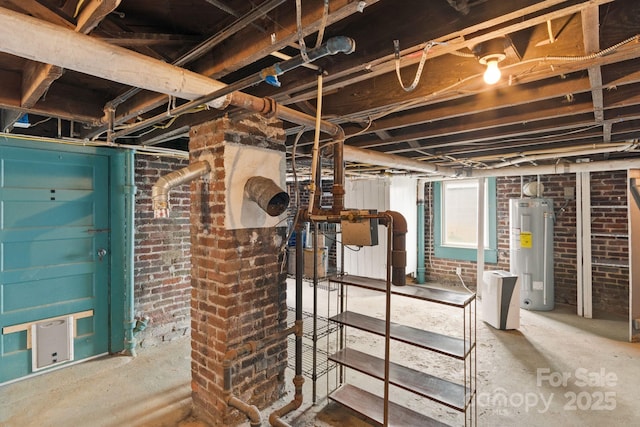 basement with brick wall and water heater